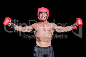 Winner boxer with arms outstretched