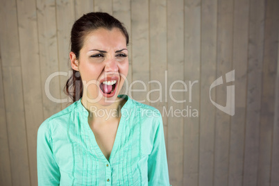 Screaming woman suffering from headache