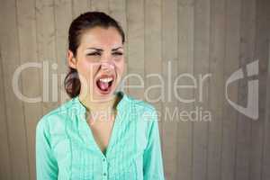 Screaming woman suffering from headache