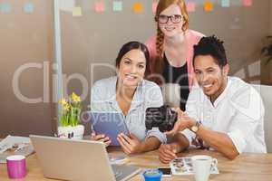 Business people with camera working in office