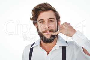Portrait of confident hipster gesturing