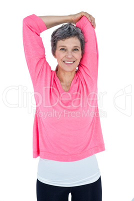 Portrait of happy woman stretching