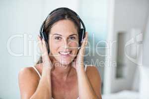 Portrait of happy woman with headphones