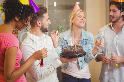 Happy business people enjoying birthday