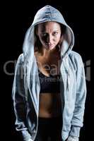 Portrait of female athlete in hood