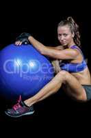 Sporty woman with exercise ball