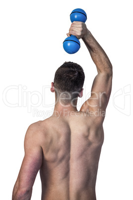 Man holding dumbbell over his head