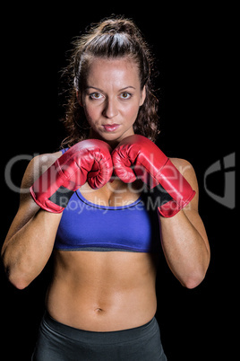 Portrait of pretty woman with fighting stance