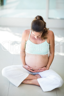 Woman sitting with crossed legs