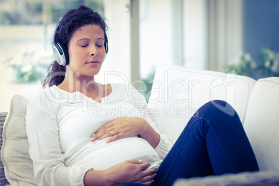 Woman with headphones relaxing