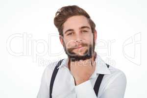 Confident hipster with hand on chin
