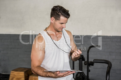 Instructor holding stopwatch and clipboard