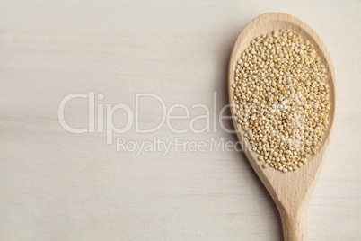 Wooden spoon of sesame seeds