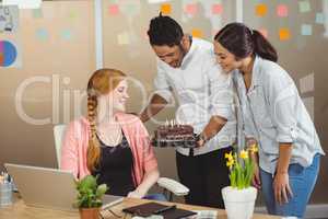 Happy business woman celebrating birthday