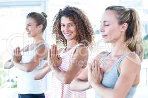 Sporty women with hands joined