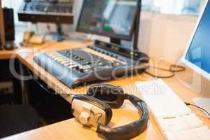Close-up of headphones on desk