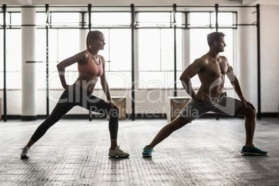 Two fit people doing fitness