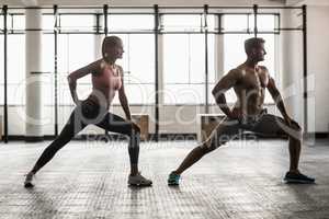 Two fit people doing fitness