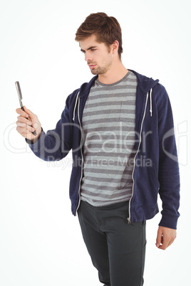 Man holding straight edge razor