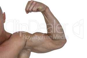 Cropped muscular man flexing bicep