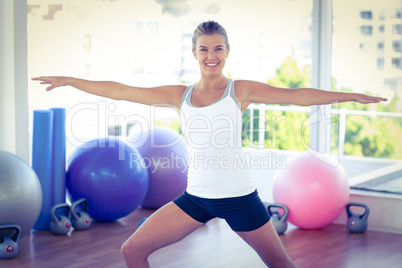 Portrait of a beautiful woman with arms outstretched