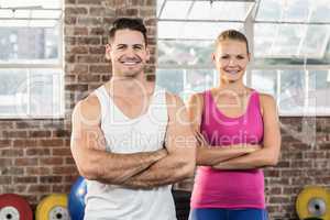 Portrait of smiling athletic couple