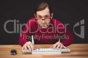 Creative businessman working at computer desk