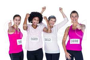 Portrait of happy female athletes gesturing