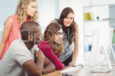 Business team working at computer desk