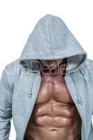Muscular man in grey hood