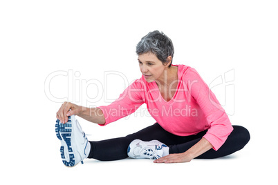 Fit mature woman exercising