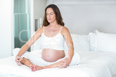 Pregnant woman meditating