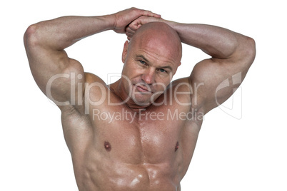 Portrait of bodybuilder with hands behind head