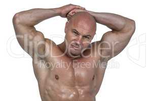 Portrait of bodybuilder with hands behind head