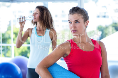 Pretty women in fitness studio