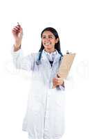 Smiling doctor holding a clipboard