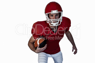 Player posing with rugby ball