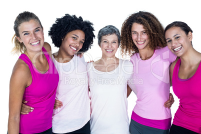 Portrait of smiling women with arms around