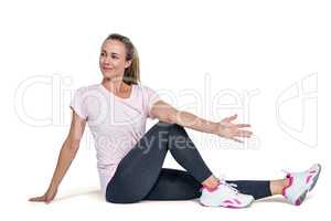 Happy sporty woman exercising