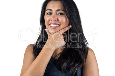 Happy woman with hand on her chin