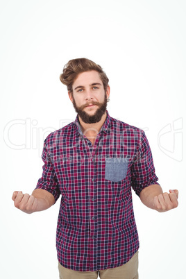 Portrait of confident hipster with clenched fist