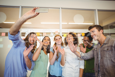 Business people gesturing white taking selfie