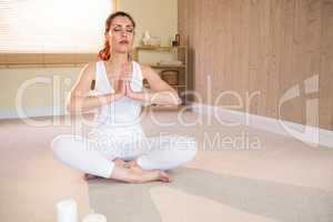 Full length of woman meditating