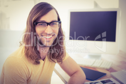 Portrait of happy hipster wearing eye glasses