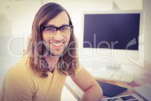 Portrait of happy hipster wearing eye glasses