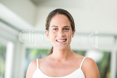 Portrait of happy woman at home