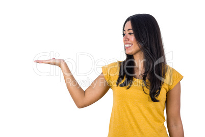 Smiling woman holding her hand up