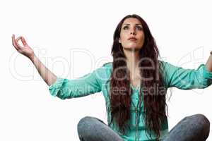 Woman levitating with arms raised