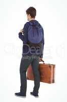 Rear view of man with backpack and briefcase