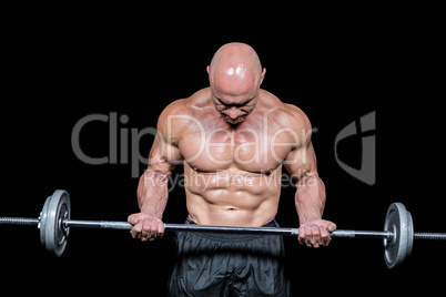 Bodybuilder exercising with crossfit